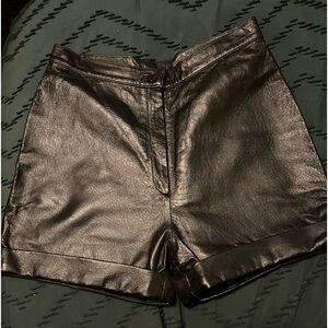 These are a pair of black short size 14